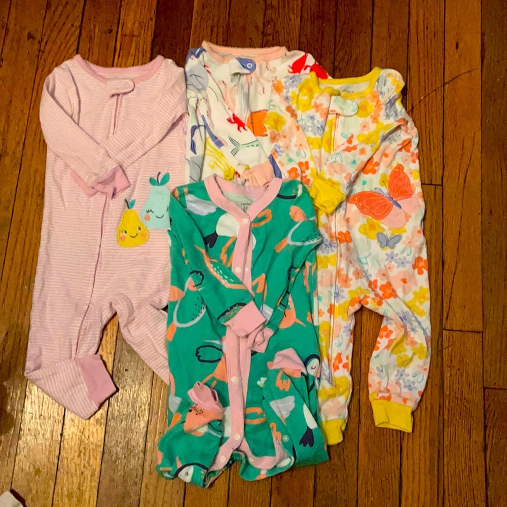 4 Carter’s baby girls pajamas. Selling for $15.00
